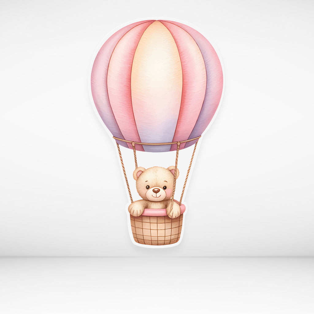 Hot air balloon cardboard cutout with pink and purple design on a light gray background